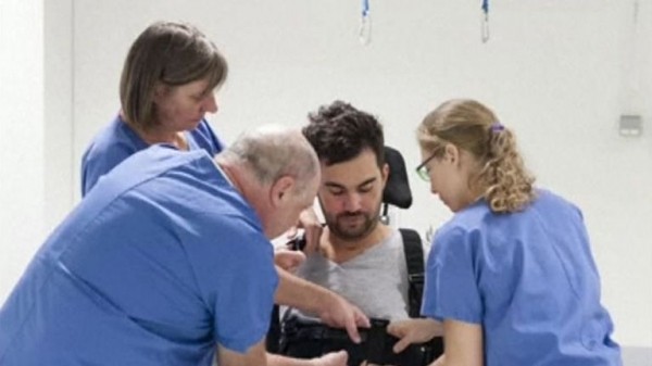 
                              Paralysed man walks using mind-controlled robotic suit
                      